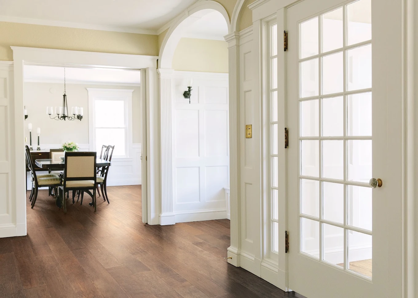 Newly installed hardwood flooring in a Bellevue, WA dining room
